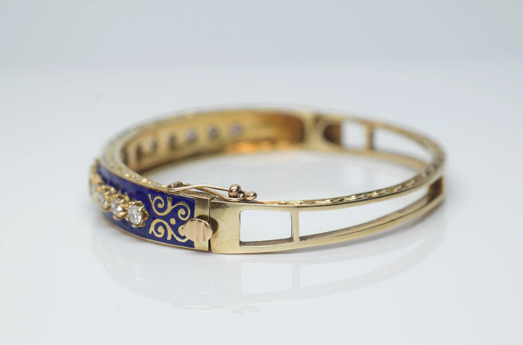 1.5CTW VINTAGE SOLID GOLD, DIAMOND AND ENAMEL BANGLE