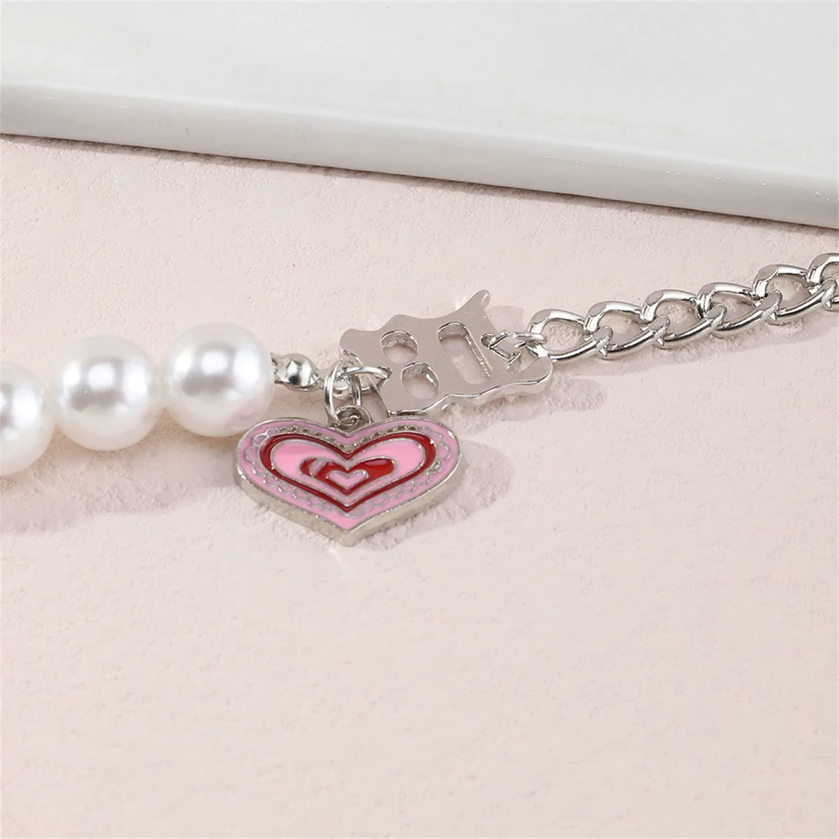 Pearl & Pink Enamel Silver-Plated Heart Charm Bracelet