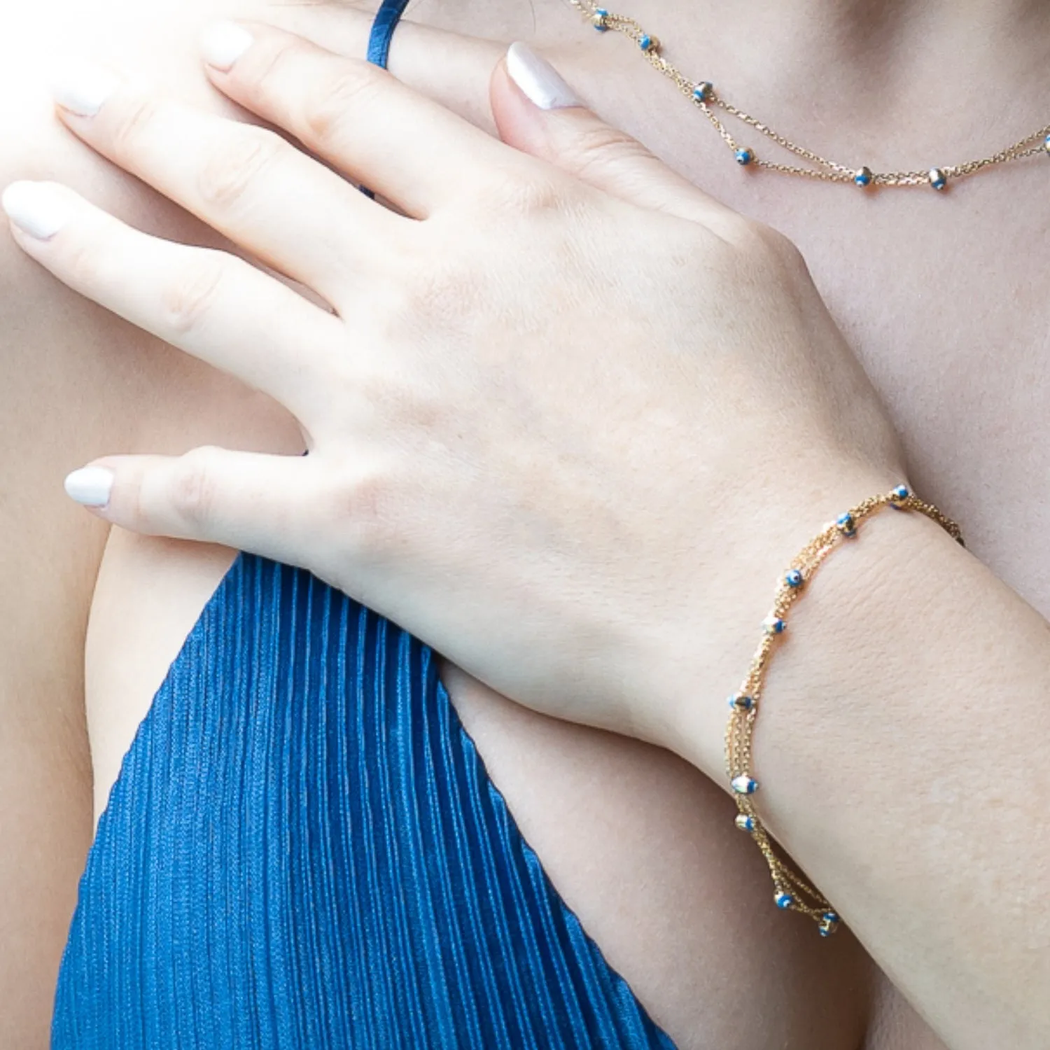 Solid Gold Triple Chain Evil Eye Design Bracelet