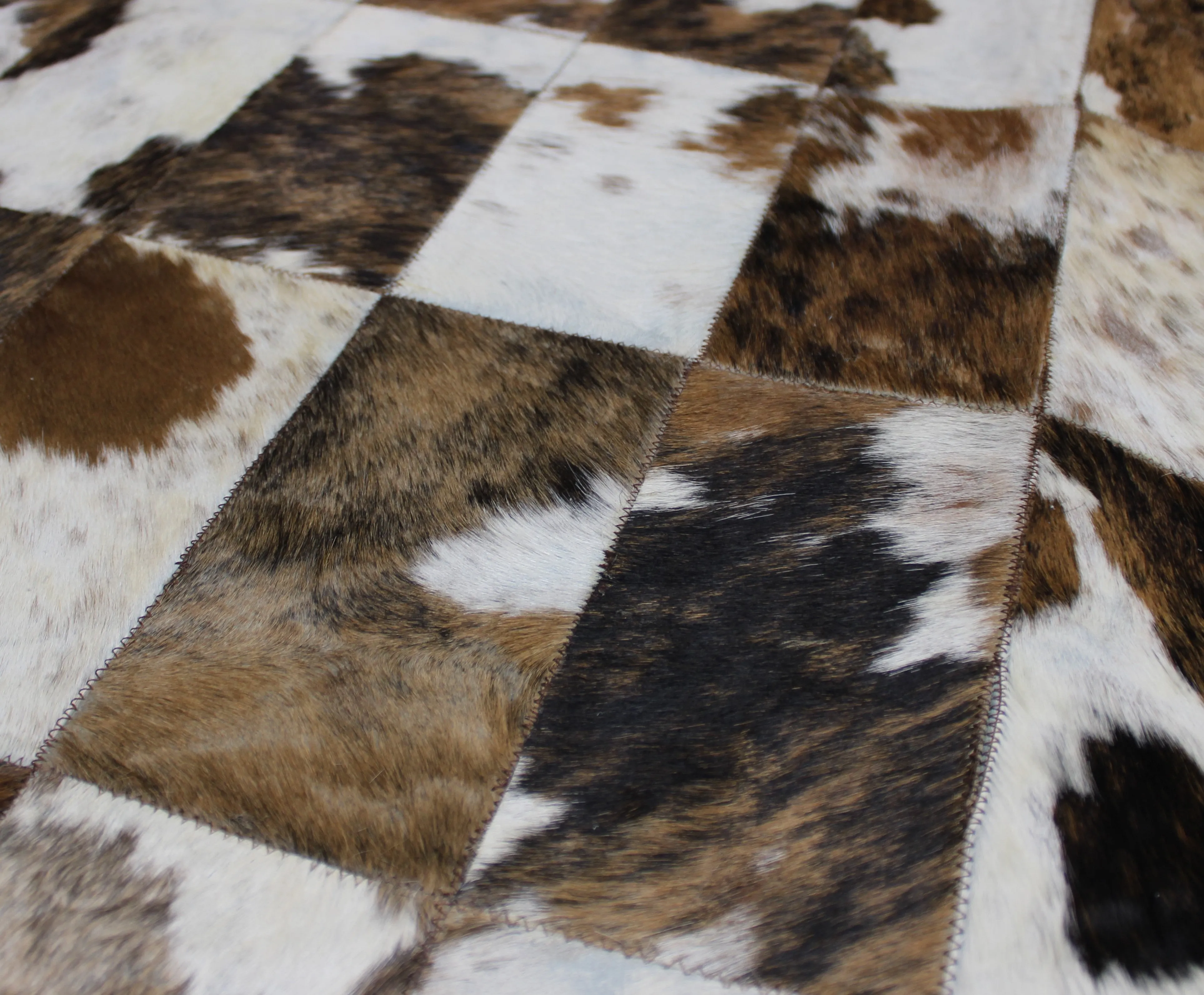 Tricolor Patchwork Cowhide Rug – 4.10 ft x 3.5 ft  Premium Cowhide Rug