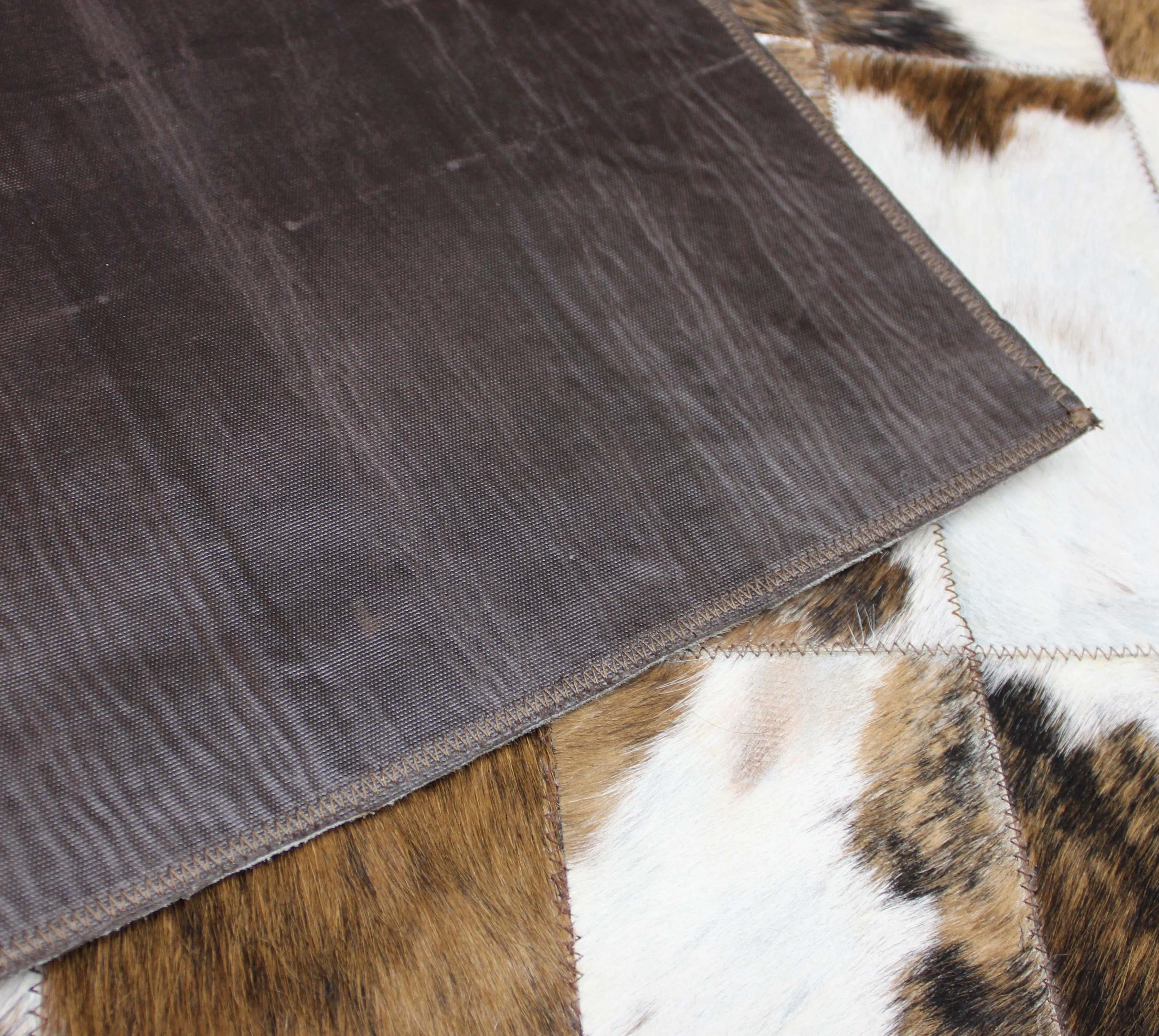 Tricolor Patchwork Cowhide Rug – 4.10 ft x 3.5 ft  Premium Cowhide Rug