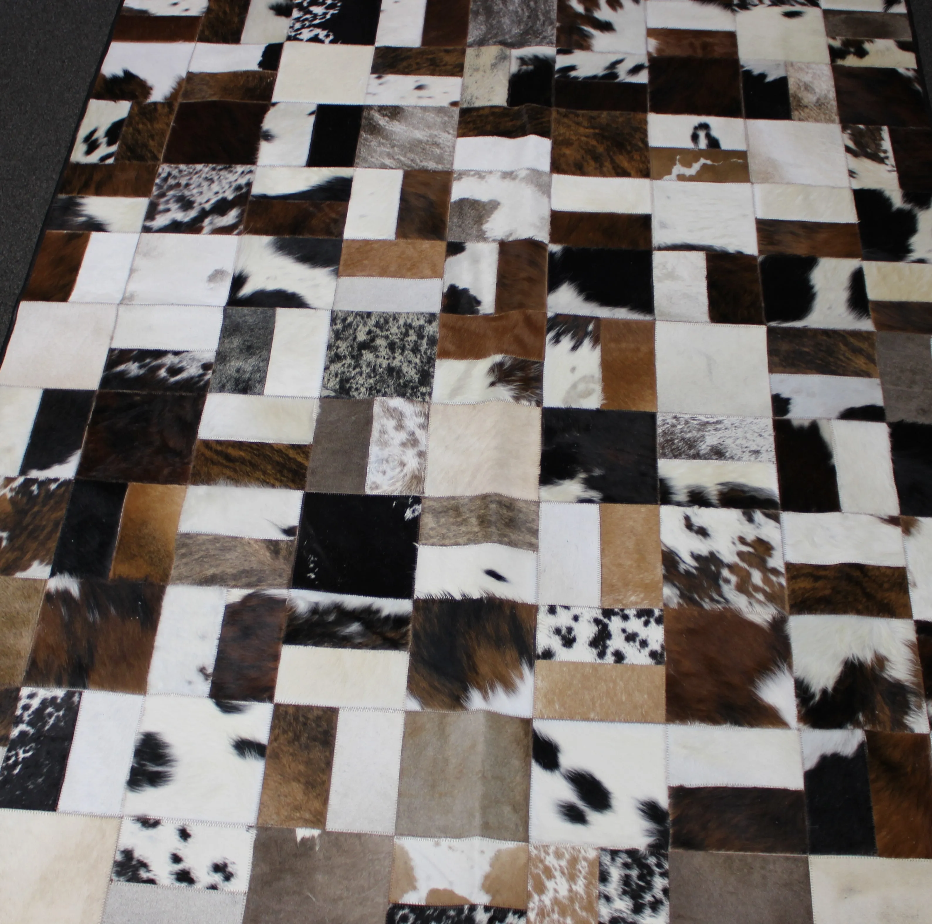 Tricolor Patchwork Cowhide Rug – 7.10ft x 5.10 ft Premium Cowhide Rug