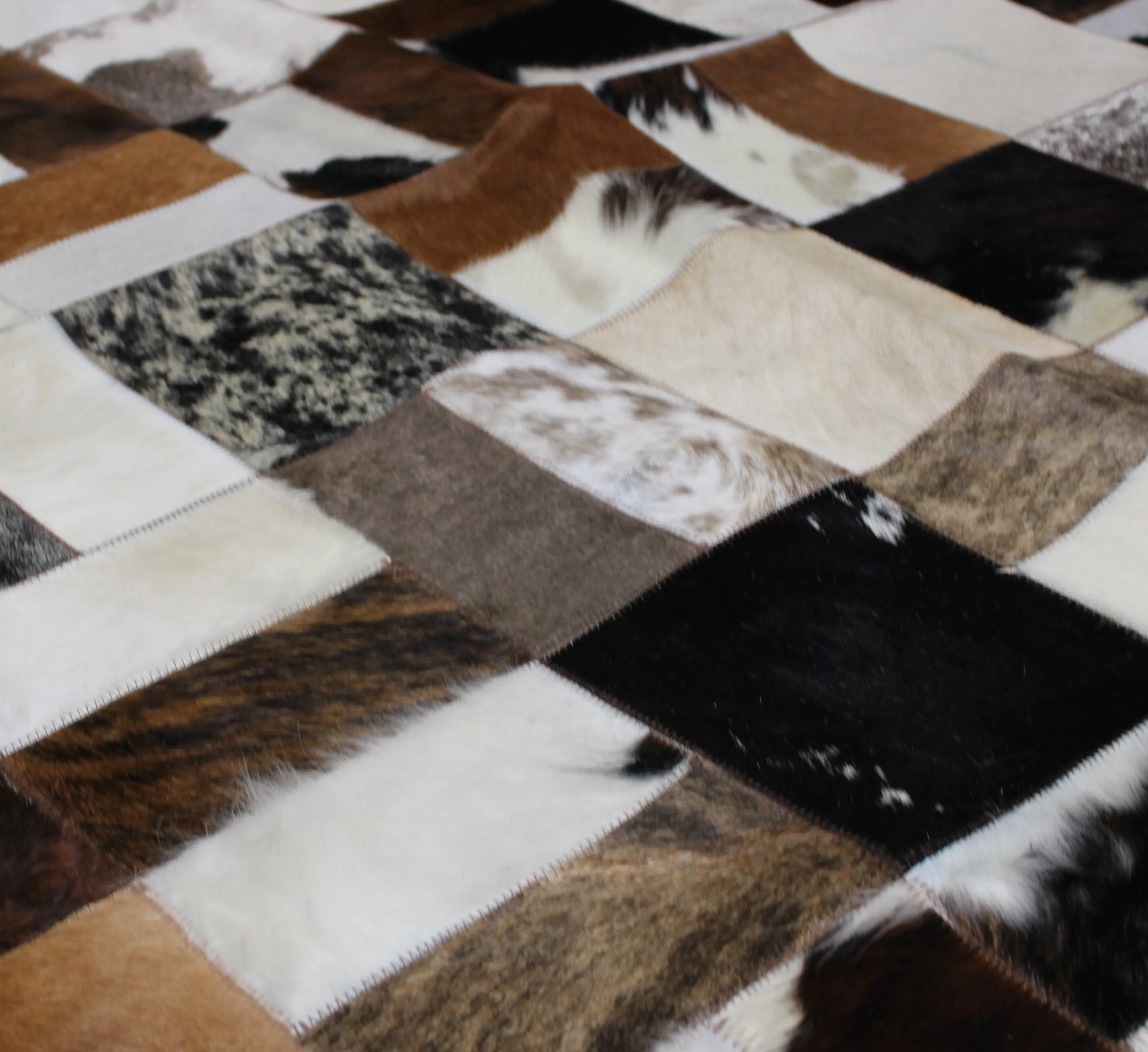 Tricolor Patchwork Cowhide Rug – 7.10ft x 5.10 ft Premium Cowhide Rug