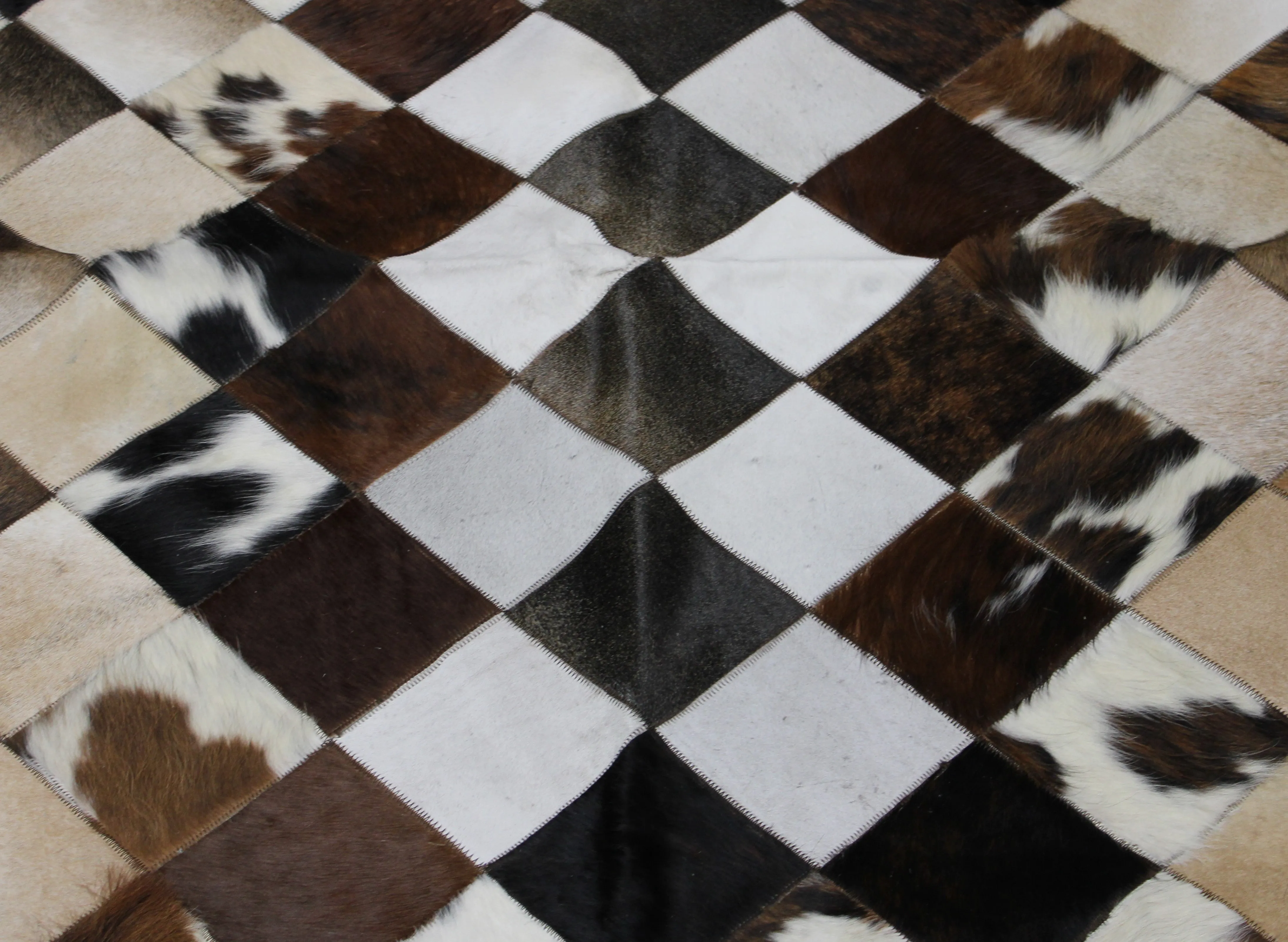 White & tricolor  Patchwork Cowhide Rug – 91 x 66 IN